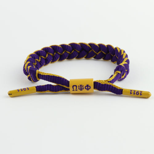 Omega Psi Phi bracelet featuring ΩΨΦ centerpiece and end caps embossed with 1911 braided paracord, adjustable, gift for Omegas, Da Bruhz only at www.thesandz.com