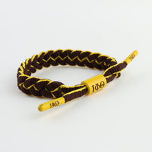 Iota Phi Theta bracelet featuring IΦΘ centerpiece and end caps embossed with 1963, braided paracord, adjustable, gift for Iotas, owtlaws  only at www.thesandz.com