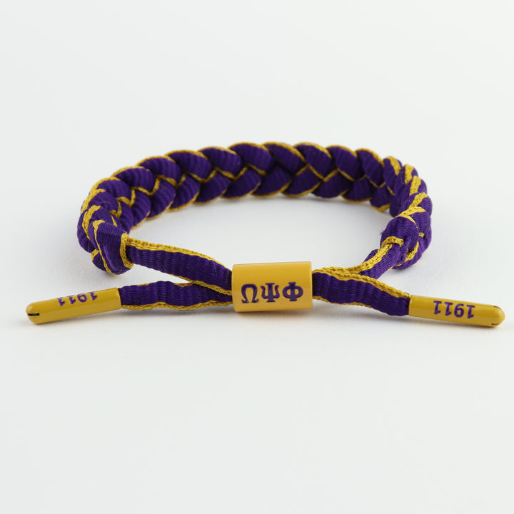 Omega Psi Phi bracelet featuring ΩΨΦ centerpiece and end caps embossed with 1911 braided paracord, adjustable, gift for Omegas, Da Bruhz only at www.thesandz.com